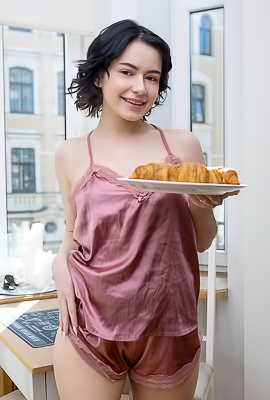 Baiba Rose-colored Silk Camisole That Skims Over Her Lovely Breasts