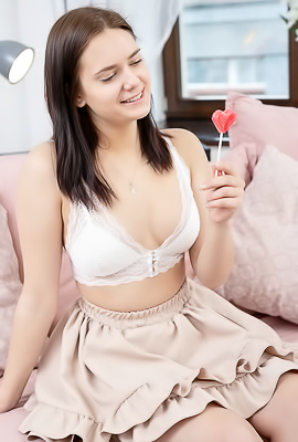 Tina Howl Flirty Look In Her Gorgeous Blue Eyes As She Sucks Her Lollipop