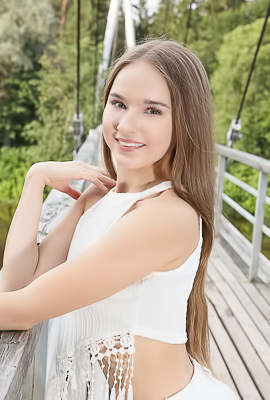 Sasha Quinn Smiling Playfully As Her Short Skirt Flips Up To Reveal She’s Not Wearing Panties