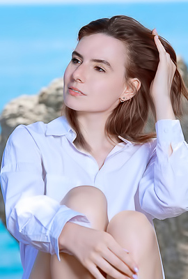 Nika Smiling With Pleasure As The Stimulating Ocean Breeze Caresses Her Sexy Body