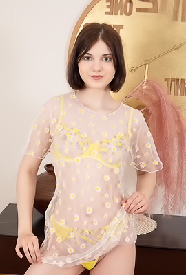 Sara Celeste Bending Over To Show How Her Thong Panties Nestle Between Her Perfect Buns