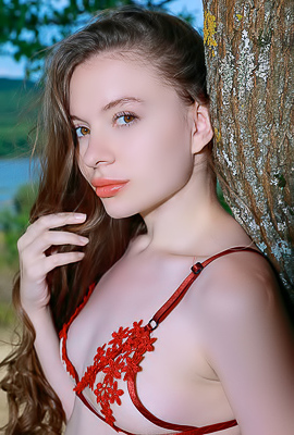 Dariana Caresses Her Lovely Breasts And Peachy Bottom