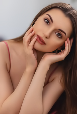 Monika May Teases And Tantalizes As She Masturbates Solo In A Seductive Striptease