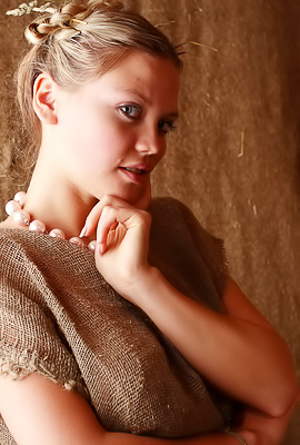 Elka Teases With Blue Eyes And Blonde Hair On A Rainy Afternoon