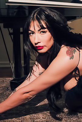 Sabina Aflame, Winged Siren in Lace by Pianos Side